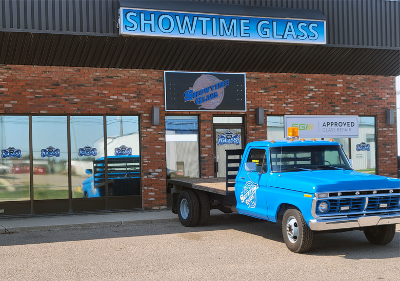 1974 Ford F-350 Shop truck parked in front of shop